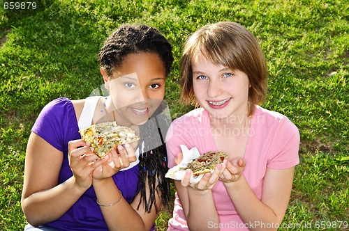 Image of Girls eating pizza