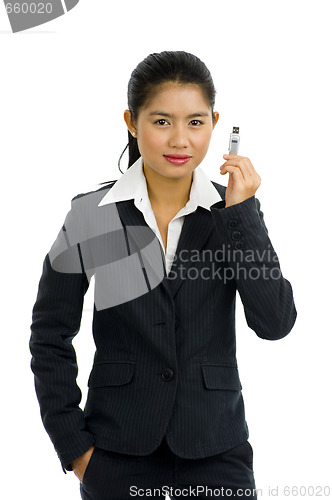 Image of beautiful business woman with usb stick
