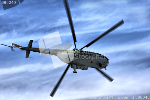 Image of Military helicopter in sky