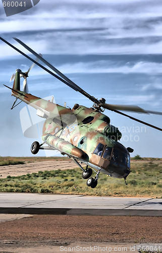 Image of Military helicopter over land