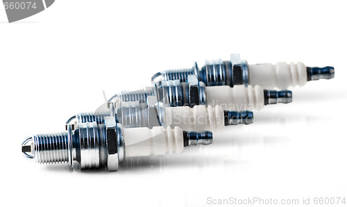 Image of Four spark plugs for car's engine