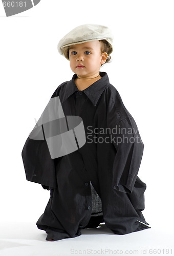 Image of baby-girl with huge shirt and hat