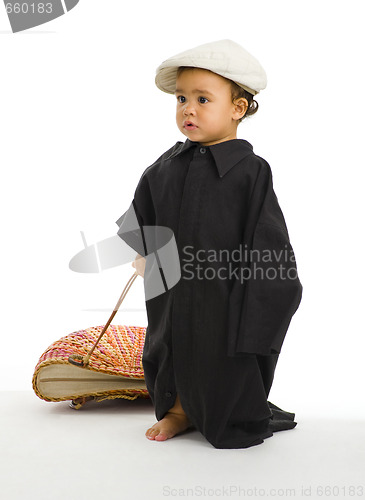 Image of girl with huge shirt, bag and hat