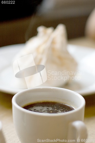 Image of cup of coffee and meringue