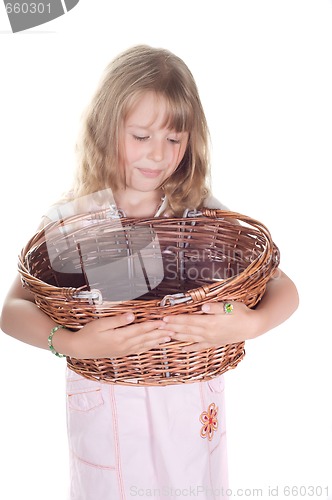 Image of Little girl playing with basket