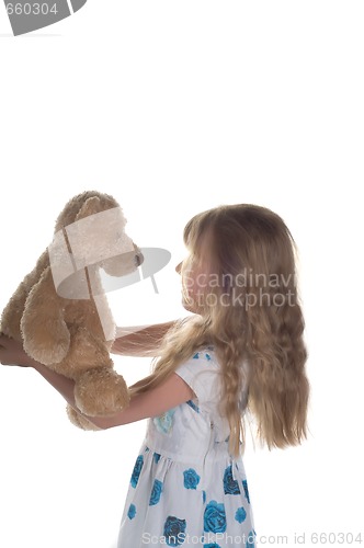 Image of Little girl playing with toy