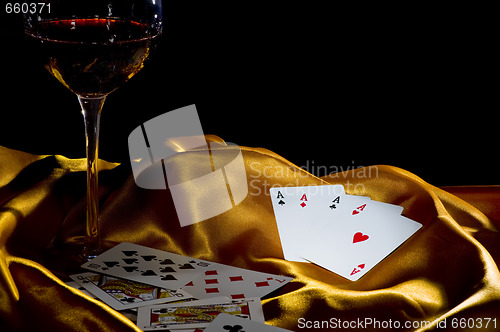 Image of poker ace and wine