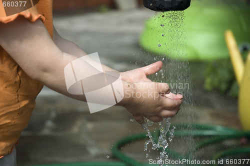 Image of washing hands