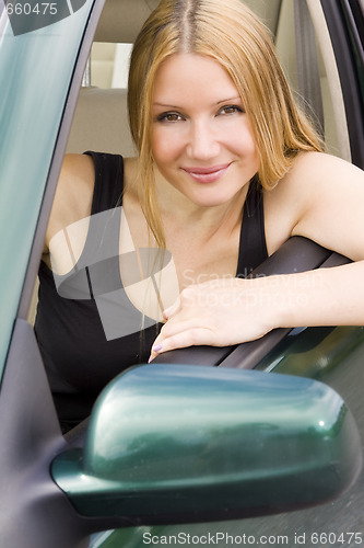 Image of pretty woman in the car