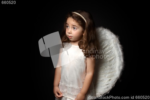 Image of Pretty little angel looking sideways