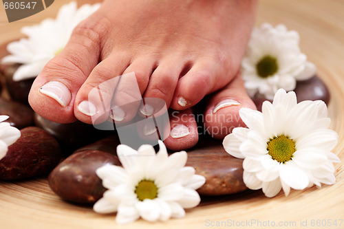 Image of feet and pebbles