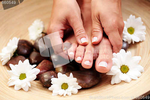 Image of feet and pebbles