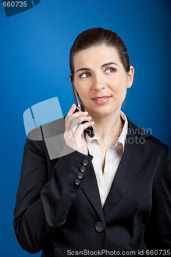 Image of Businesswoman calling at phone