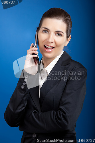 Image of Businesswoman calling at phone
