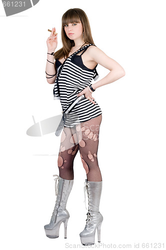 Image of Girl in a striped dress and silvery boots