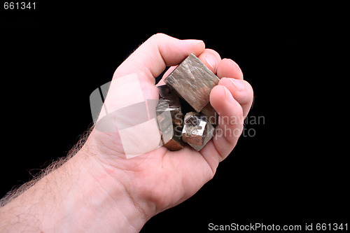 Image of gold in the hand