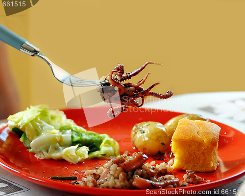 Image of Appetizing squid on fork