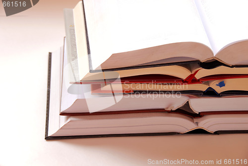 Image of Opened books stack