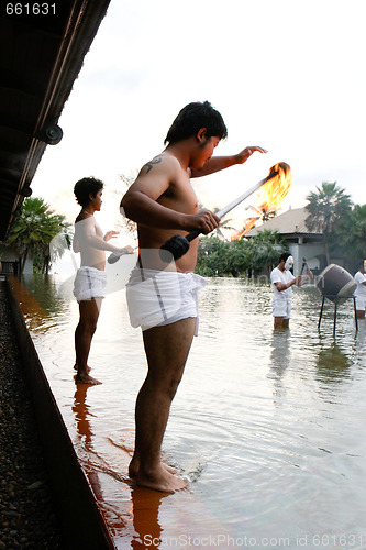 Image of PHUKET - AUGUST 19: Traditional Thai dancers perform a ceremony 