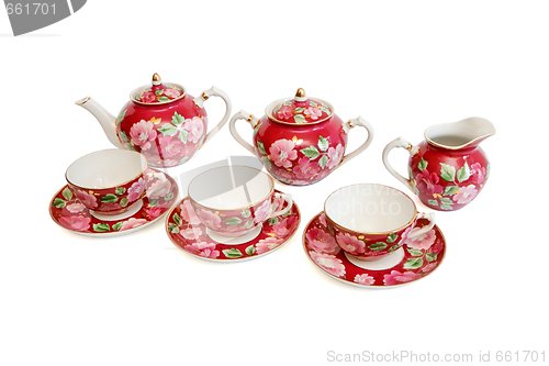 Image of Beautiful red tea service isolated