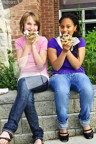Image of Girls eating pizza