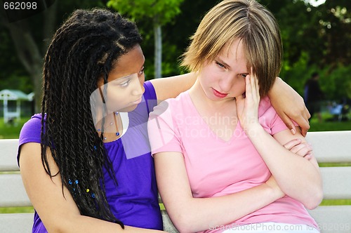 Image of Teenager consoling her friend