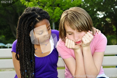 Image of Teenager consoling her friend