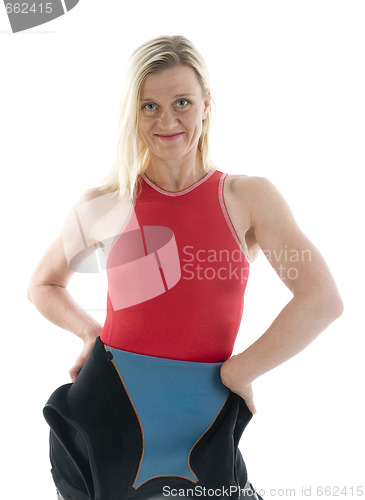 Image of middle age female triathlete in swimming wet suit