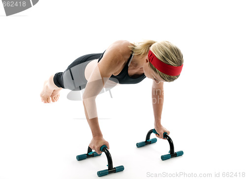 Image of   push up fitness bars woman exercising