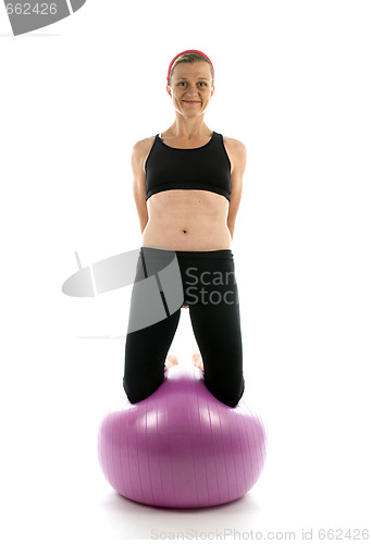 Image of balance exercise strength pose middle age woman fitness core bal