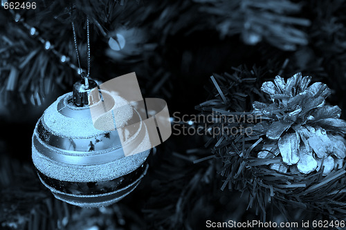 Image of Christmas ornaments on tree.