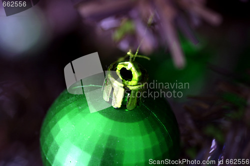 Image of Christmas ornaments on tree.