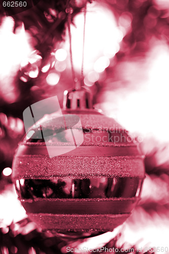 Image of Christmas ornaments on tree.