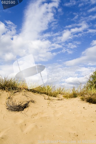 Image of Sand dunes under a nice clouded sky