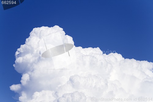 Image of Clear Blue Sky and sunlit white cloud