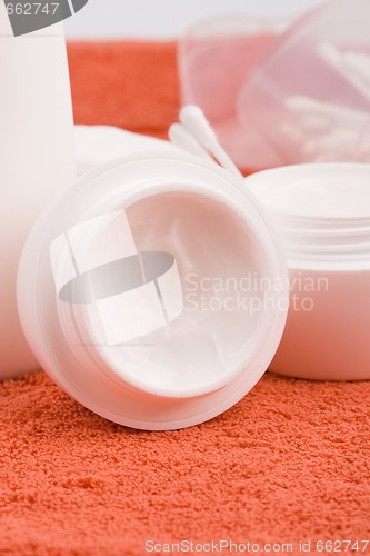 Image of cream and cotton pads