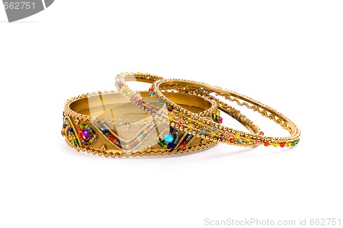 Image of three golden bracelets