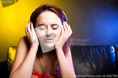 Image of Beautiful woman with headphones