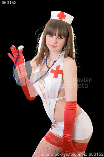 Image of Young sexy nurse with a stethoscope. Isolated