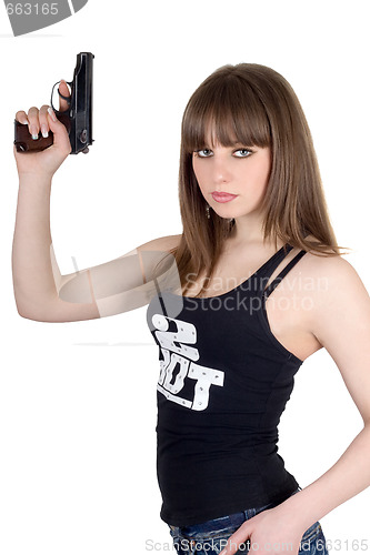 Image of Pretty young woman with pistol. Isolated on white