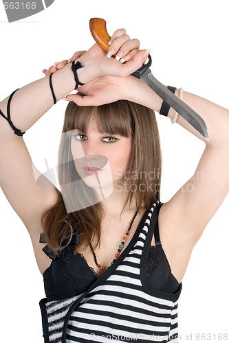 Image of Pretty girl in a striped dress with a knife