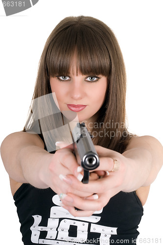 Image of Pretty girl in a vest with pistol 