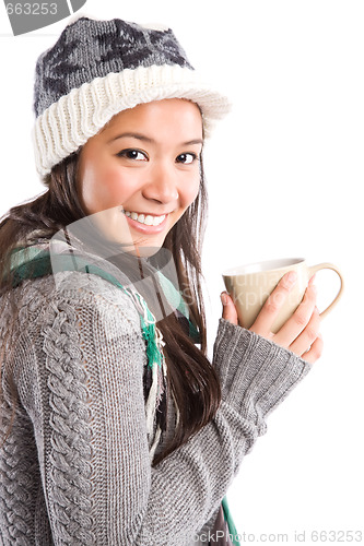 Image of Beautiful asian woman drinking coffee