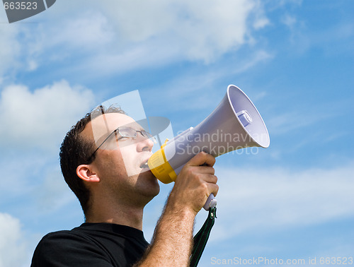 Image of Man Talking Into Megaphone