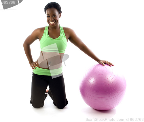 Image of young pretty hispanic african american woman exercising with fit