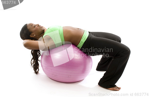 Image of young pretty hispanic african american woman exercising with fit