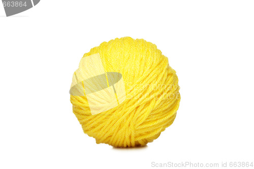 Image of Yellow yarn ball over white