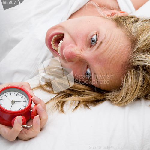 Image of Woman waking up Late