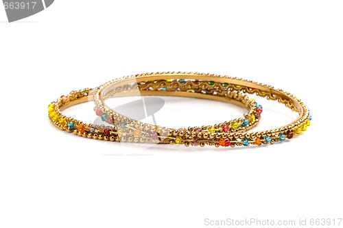 Image of two golden bracelets