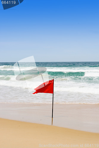Image of Red flag at the beach.